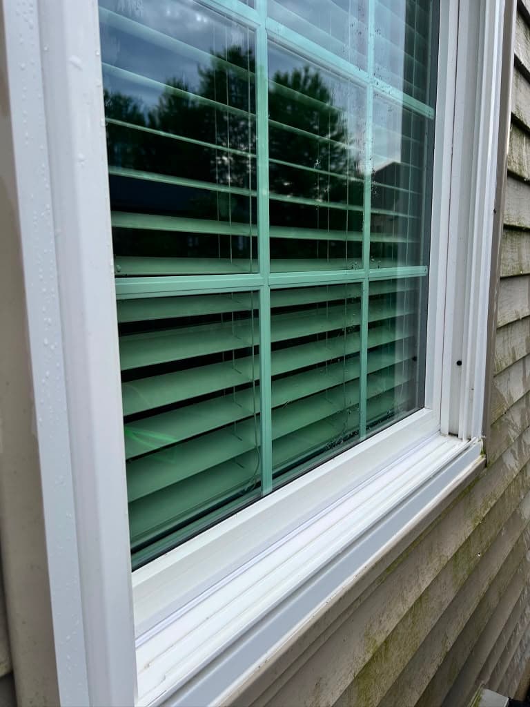 The same sill and track cleaned white after window cleaning